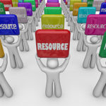 March 2018 Newsletter image featuring features holding a resource sign.