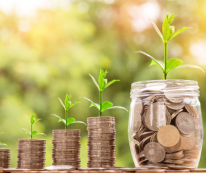 Coins growing and saving money